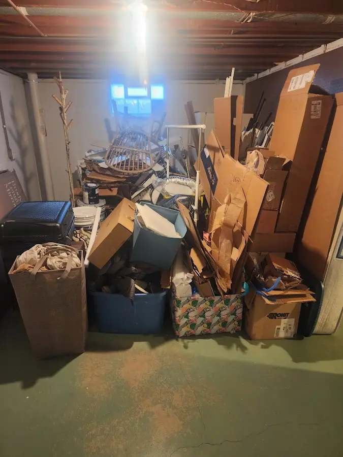 Roll-off dumpster container at job site for 4 Yard Dumpster Rental in Forest Hill